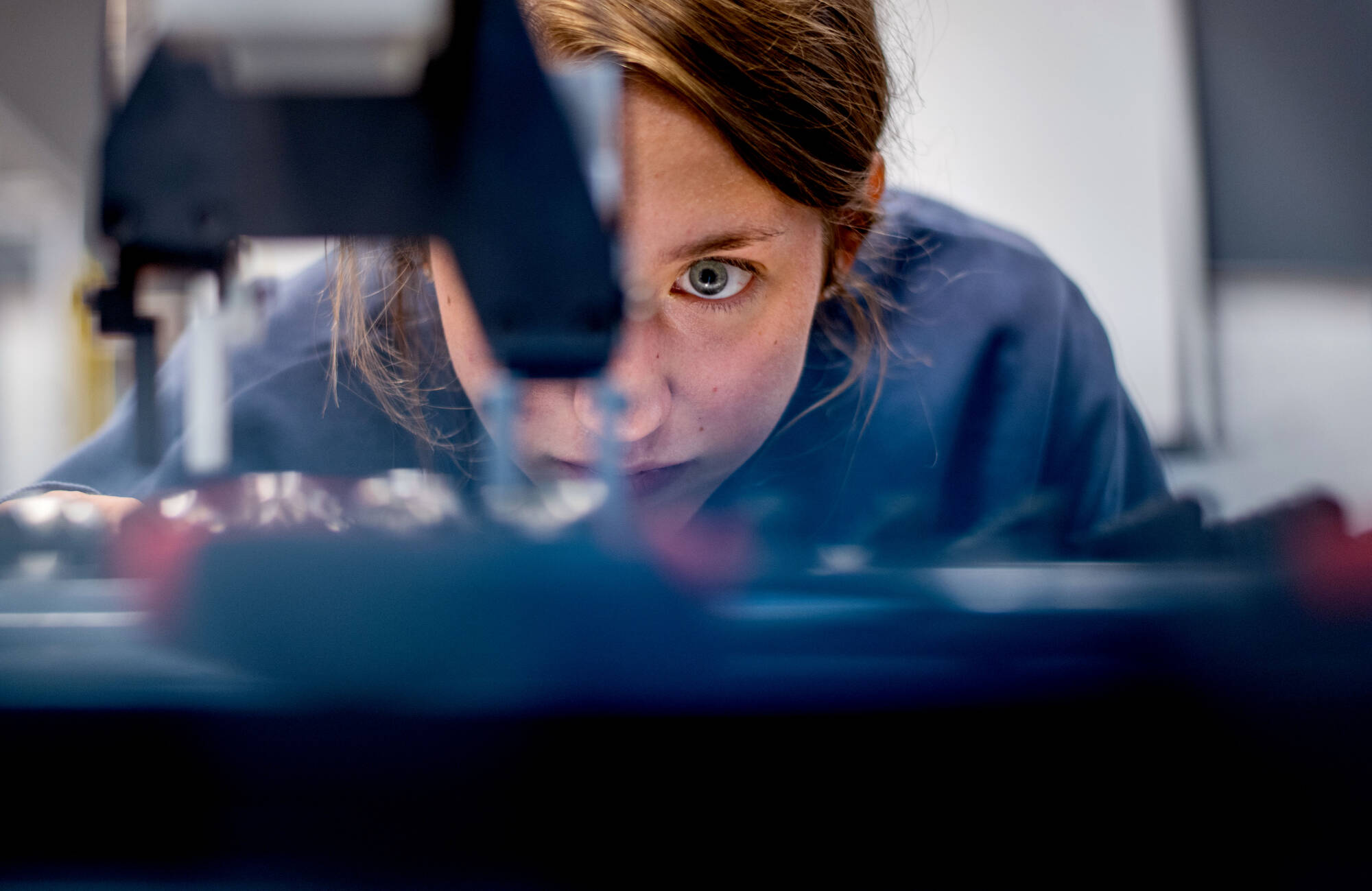 "It's the last big hurdle," said Jenna Doyle, a senior biomedical engineering student, as they work on tweaking an automated press-fit assembly cell senior project for the Engineering Design Conference on August 4.